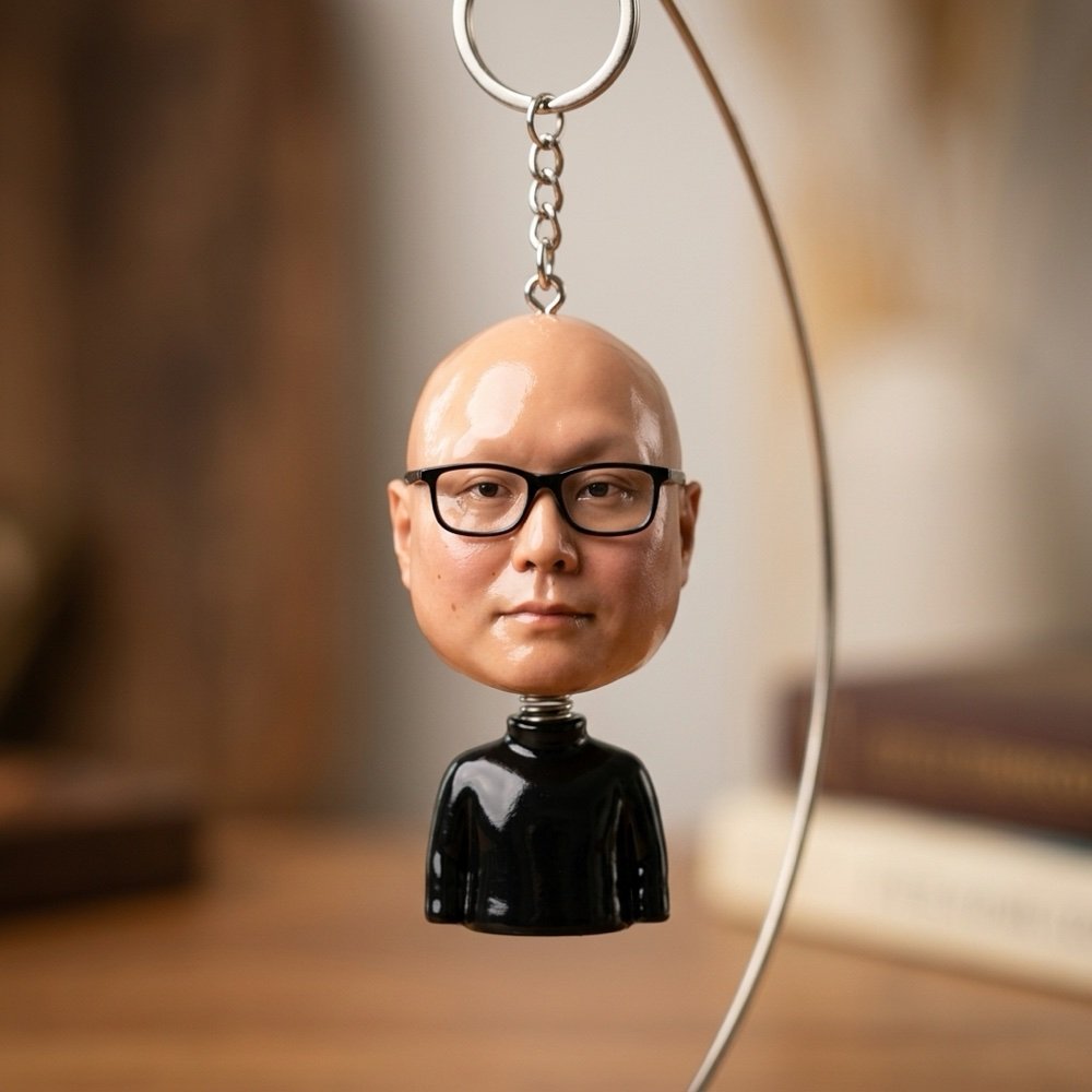 John Kim mini head keychain